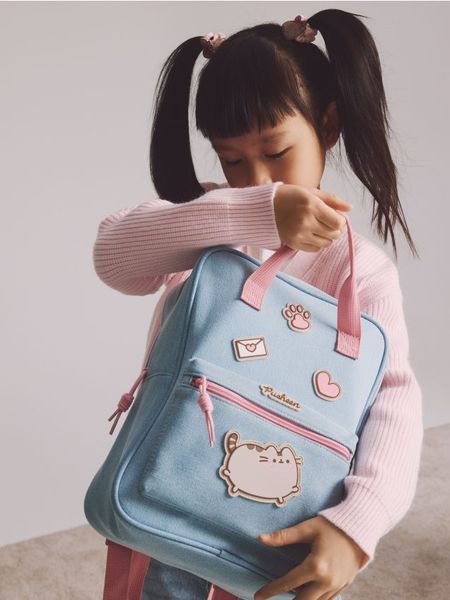 Plecak Pusheen - jasnoniebieski. Niebieskie torby i plecaki dziecięce Reserved, z tkaniny. W wyprzedaży za 55.99 zł.