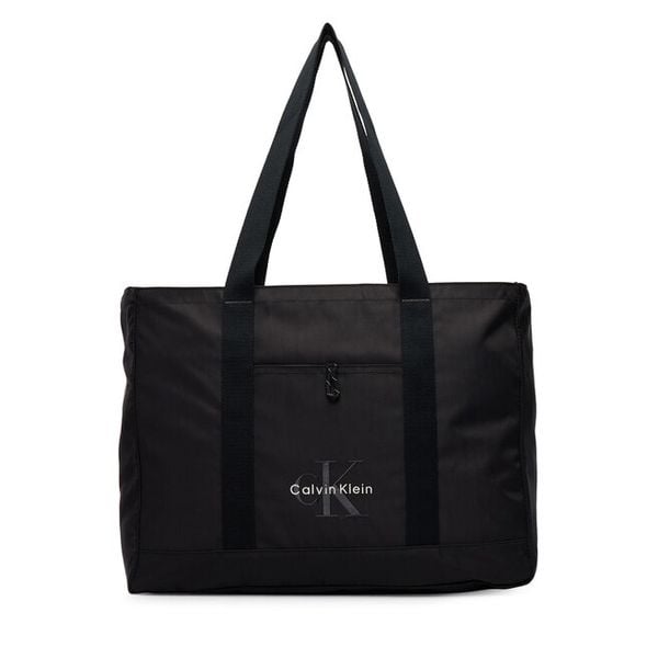 Torebka Calvin Klein. Czarne torebki do ręki damskie Calvin Klein, bez wzorów, bez dodatków. Za 369.99 zł.