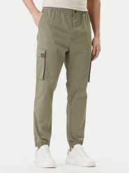 Calvin Klein Jeans Joggery Comfort LV04RD608G Beżowy Skinny Fit. Brązowe spodnie materiałowe męskie Calvin Klein Jeans, m, bez wzorów, z bawełny. Za 419.99 zł.