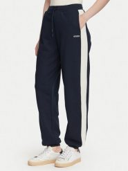 Guess Spodnie dresowe V6YB09 K4292 Granatowy Regular Fit. Niebieskie spodnie dresowe damskie Guess, m, z aplikacjami, z dresówki. Za 394.99 zł.