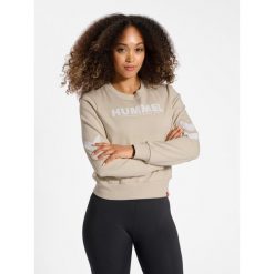Bluza damska Hummel Legacy. Szare bluzy sportowe damskie Hummel, bez wzorów, bez kaptura, na fitness i siłownię. Za 167.00 zł.