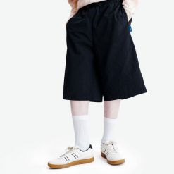 Bermudy męskie Heritage. Czarne szorty męskie Decathlon, l, bez wzorów, z dresówki. Za 89.99 zł.