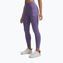 Legginsy treningowe damskie Under Armour Motion Ankle. Fioletowe legginsy sportowe damskie Under Armour, bez wzorów, na fitness i siłownię. Za 129.99 zł.