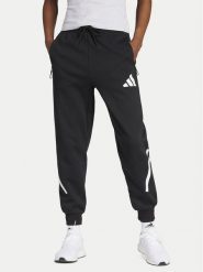 Adidas Spodnie dresowe Z.N.E. JC9309 Czarny Regular Fit. Czarne spodnie dresowe damskie Adidas, s, bez wzorów, z bawełny. Za 289.99 zł.