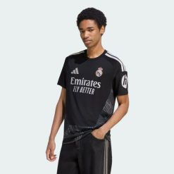 Koszulka Real Madrid 26/27 Home Goalkeeper. Czarne koszulki sportowe męskie Adidas, m, bez wzorów, z dżerseju, bez kołnierzyka, bez ramiączek, do piłki nożnej, climacool (adidas). Za 439.00 zł.