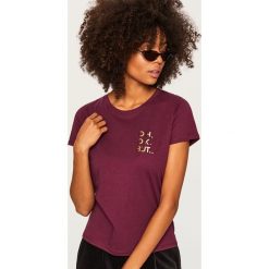 T-shirt z napisem - Różowy. T-shirty damskie marki Reserved. W wyprzedaży za 14.99 zł.