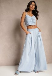 Jasnoniebieski Komplet z Wiskozą Szerokie Spodnie Top z Usztywnianymi Miseczkami Tirtebis. Niebieskie spodnie materiałowe damskie Renee, l, bez wzorów, z wiskozy. Za 79.99 zł.