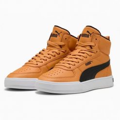 Buty Sportowe Młodzieżowe Puma Caven Mid Fur Jr. Brązowa obuwie sportowe damskie Puma, bez wzorów, z materiału, trekkingowe. Za 184.80 zł.