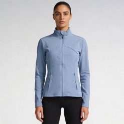 Damska kurtka Softee Fusion Azul Acero. Niebieskie kurtki damskie Softee, m, bez wzorów, z elastanu, bez kaptura, na fitness i siłownię. Za 197.99 zł.