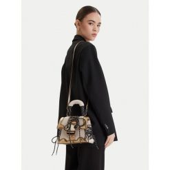 Torebka Steve Madden. Żółte torebki do ręki damskie Steve Madden, bez wzorów, klasyczne, bez dodatków. Za 356.99 zł.