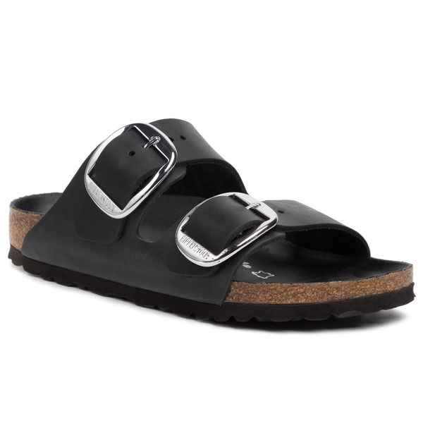Klapki Birkenstock. Czarne klapki damskie Birkenstock, bez wzorów, bez obcasa. Za 489.99 zł.