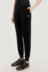GUESS Czarne damskie spodnie dresowe Couture, Rozmiar S. Czarne spodnie dresowe damskie Guess, s, z aplikacjami, z dresówki. W wyprzedaży za 224.99 zł.