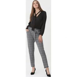 Czarne Spodnie Amalfi. Czarne spodnie materiałowe damskie Born2be, l, bez wzorów, z materiału. Za 49.99 zł.