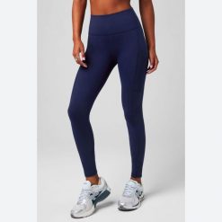 Damskie legginsy Fabletics On-The-Go. Niebieskie legginsy damskie FABLETICS, bez wzorów, na fitness i siłownię. Za 327.85 zł.
