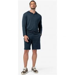 Spodenki dresowe męskie SUPER.NATURAL Solution Shorts. Niebieskie krótkie spodenki sportowe męskie super.natural, m, bez wzorów, z dresówki, trekkingowe. Za 430.00 zł.