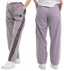 Spodnie damskie adidas Future Icons Three Stripes Woven. Fioletowe spodnie materiałowe damskie Adidas, m, bez wzorów, z materiału. Za 229.99 zł.