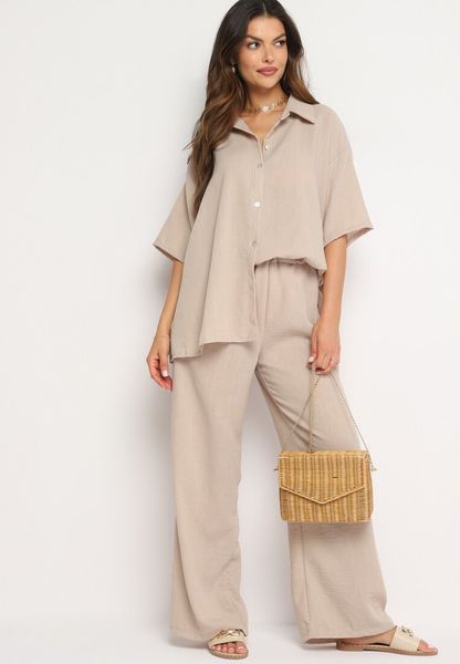 Ciemnobeżowy Komplet 2-Częściowy Koszula o Luźnym Kroju Szerokie Spodnie z Gumką w Talii Vimitha. Brązowe koszule damskie Born2be, uniwersalny, z aplikacjami, z materiału. Za 149.99 zł.