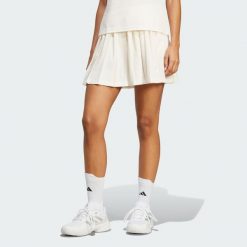 Spódnica adidas Heritage Tennis Classic. Białe spódnice damskie Adidas, s, bez wzorów, z materiału, klasyczne, sportowe. W wyprzedaży za 258.80 zł.