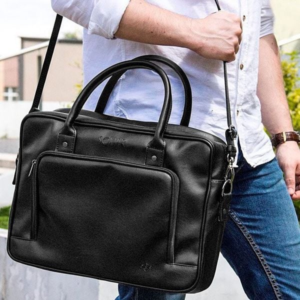 Torba męska na laptopa SOLIER S19 czarna. Czarne torby na laptopa męskie Solier, bez wzorów, ze skóry ekologicznej. Za 187.99 zł.