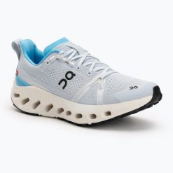 Buty do biegania damskie On Cloudsurfer Trail. Niebieskie obuwie sportowe damskie On, bez wzorów, z materiału, do biegania. Za 529.99 zł.