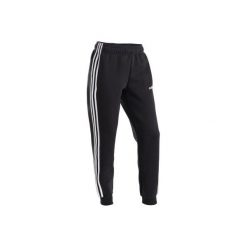 Spodnie chłopięce czarne z 3 paskami. Czarne spodnie materiałowe dla chłopców Adidas, bez wzorów, z bawełny. Za 159.99 zł.