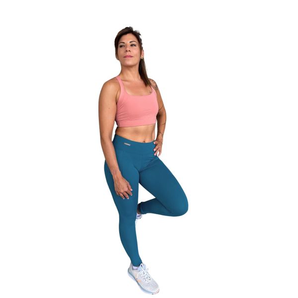 Legginsy damskie Les Poulettes Fitness vert canard. Niebieskie legginsy damskie LES POULETTES FITNESS, bez wzorów, z materiału, na fitness i siłownię. W wyprzedaży za 323.50 zł.