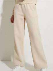 Spodnie dresowe wide leg - kremowy. Białe spodnie dresowe damskie Sinsay, l, bez wzorów, z dresówki. Za 39.99 zł.