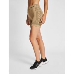 Damskie półwysokie spodenki typu bib Hummel Shaping. Brązowe szorty sportowe damskie Hummel, s, bez wzorów, eleganckie, do siatkówki. Za 117.00 zł.