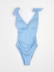 Jednoczęściowy ciążowy strój kąpielowy z marszczeniami - błękitny. Niebieskie kostiumy jednoczęściowe damskie Sinsay, l, bez wzorów, moda ciążowa. Za 69.99 zł.
