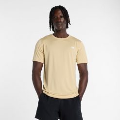 Koszulka męska New Balance MT61O0U4ABC – żółta. Żółte koszulki sportowe męskie New Balance, l, bez wzorów, z materiału, bez kołnierzyka, bez ramiączek, do biegania. Za 129.99 zł.