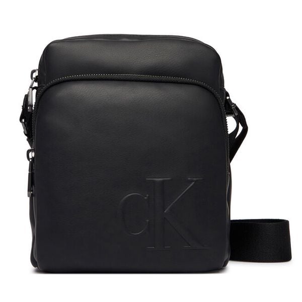 Saszetka Calvin Klein. Czarne saszetki męskie Calvin Klein, młodzieżowe, małe. Za 262.99 zł.