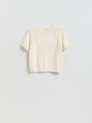 Bawełniany sweter - kremowy. Białe swetry damskie Reserved, l, bez wzorów, z bawełny, bez kołnierzyka, bez ramiączek, bez kaptura. Za 109.99 zł.