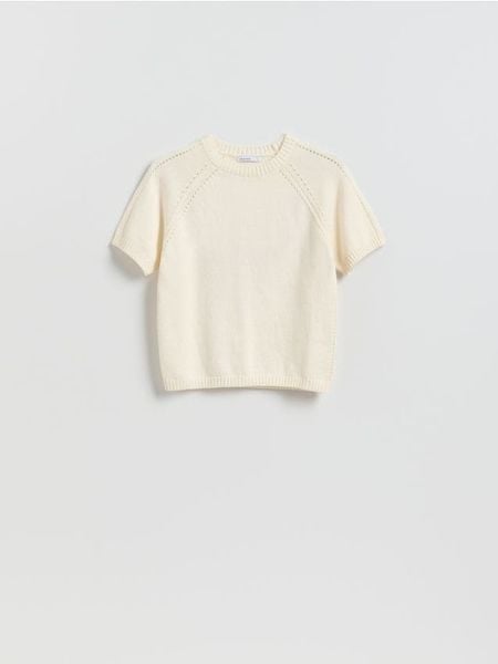 Bawełniany sweter - kremowy. Białe swetry damskie Reserved, l, bez wzorów, z bawełny, bez kołnierzyka, bez ramiączek, bez kaptura. Za 109.99 zł.