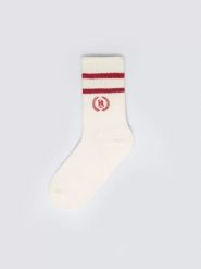 Skarpety damskie długie białe z czerwonymi paskami Prepaliana 603. Czerwone skarpety damskie Big Star, bez wzorów, z bawełny. Za 19.99 zł.