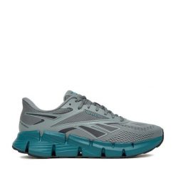 Buty do biegania Reebok. Niebieskie buty sportowe męskie Reebok, bez zapięcia, do biegania. Za 389.99 zł.