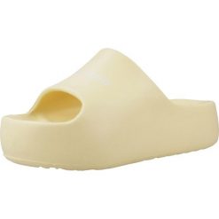 Sandały TOMMY JEANS TJW CHUNKY FLATFORM SLID Żółty. Żółte klapki damskie Tommy Hilfiger, bez wzorów, z gumy, bez obcasa. Za 177.99 zł.