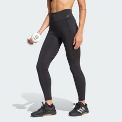 Legginsy treningowe Optime Workout Full Length. Czarne bielizna termoaktywna damska Adidas, bez wzorów, ze skóry, bez ramiączek. Za 259.00 zł.