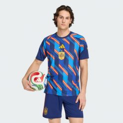 Przedmeczowa koszulka domowa Hiszpania 26. Niebieskie koszulki sportowe męskie Adidas, m, bez wzorów, z materiału, bez kołnierzyka, bez ramiączek, do piłki nożnej, climacool (adidas). Za 299.00 zł.