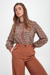 Koszula damska jedwabna LIU JO. Koszule damskie Liu Jo, bez wzorów, z jedwabiu, bez kołnierzyka, bez ramiączek. W wyprzedaży za 779.40 zł.