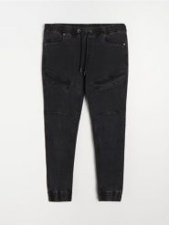 Spodnie jogger slim fit - czarny. Czarne spodnie materiałowe męskie Sinsay, bez wzorów, z jeansu. Za 99.99 zł.