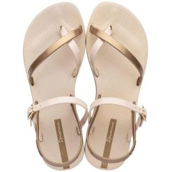 Buty do chodzenia damskie Ipanema 8284220352. Żółte klapki damskie Ipanema, bez wzorów, z materiału, bez obcasa. Za 89.99 zł.