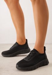 Czarne Dzianinowe Sneakersy na Grubej Podeszwie ze Żłobieniami Enolora. Czarne obuwie sportowe damskie Born2be, bez wzorów, z dzianiny, na fitness i siłownię. Za 79.99 zł.