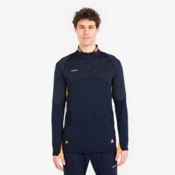 Bluza piłkarska Kipsta CLR na krótki suwak. Brązowe bluzy męskie KIPSTA, xl, bez wzorów, z materiału, bez kaptura, na fitness i siłownię. Za 149.99 zł.