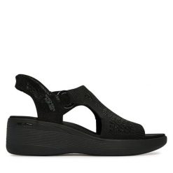 Sandały Skechers. Czarne sandały damskie Skechers, bez wzorów, bez obcasa, na koturnie, bez zapięcia. Za 359.99 zł.