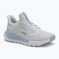 Buty Reebok Reebok Flex Trainer moon/Y2K. Białe obuwie sportowe damskie REEBOK FITNESS, bez wzorów, na fitness i siłownię. Za 329.99 zł.