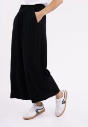 Luźne, szerokie spodnie R-AMINA. Czarne spodnie materiałowe damskie Volcano, s, bez wzorów, z materiału. Za 129.99 zł.