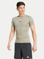 Adidas Koszulka techniczna Techfit Compression JE6700 Zielony Slim Fit. Zielone koszulki sportowe męskie Adidas, m, bez wzorów, z syntetyku, bez kołnierzyka, bez ramiączek, na fitness i siłownię, techfit (adidas). Za 99.99 zł.