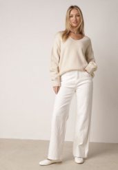 Białe Szerokie Jeansy z Bawełną Zdobione Przeszyciami w Romby Biretha. Białe jeansy damskie Born2be, z podwyższonym stanem. Za 109.99 zł.