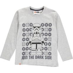Koszulka w kolorze szarym. Szare t-shirty dla chłopców marki LEGO Wear, z bawełny, z długim rękawem. W wyprzedaży za 42.95 zł.