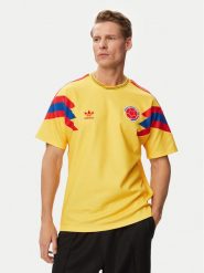 Adidas Koszulka techniczna Colombia Away Jersey 1990 JN3713 Żółty Regular Fit. Żółte koszulki sportowe męskie Adidas, m, bez wzorów, z jersey, bez kołnierzyka, bez ramiączek, do piłki nożnej. Za 479.99 zł.